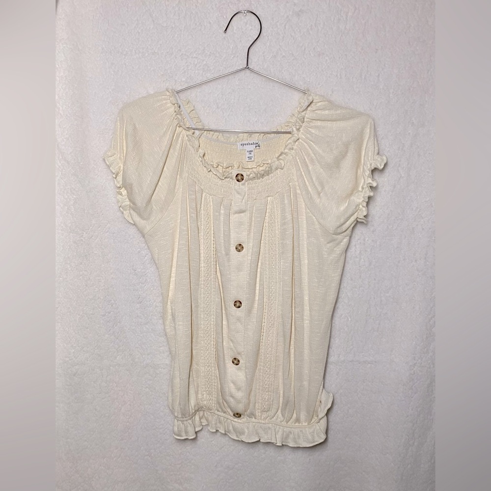 Can be a regular shirt or shoulder top.